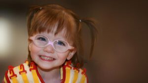 Anna Hartman as a toddler in her suit therapy vest.